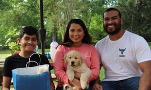 The dog named Austin with the Mata family.