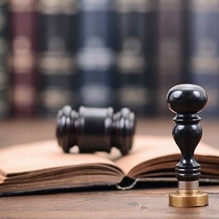 Trusts Miami — Notary Seal And Judge Gavel On The Wooden Background in Hollywood, FL