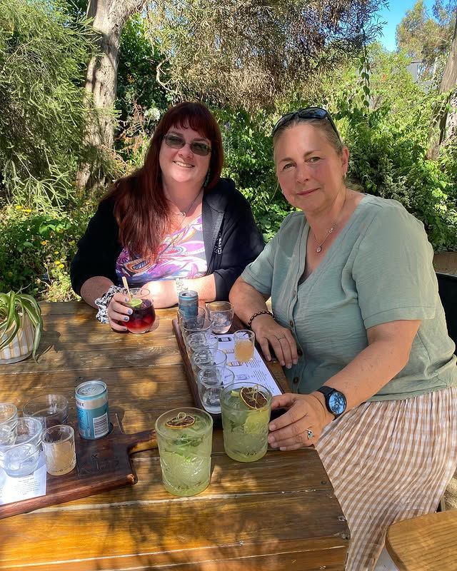 Two women enjoying drinks