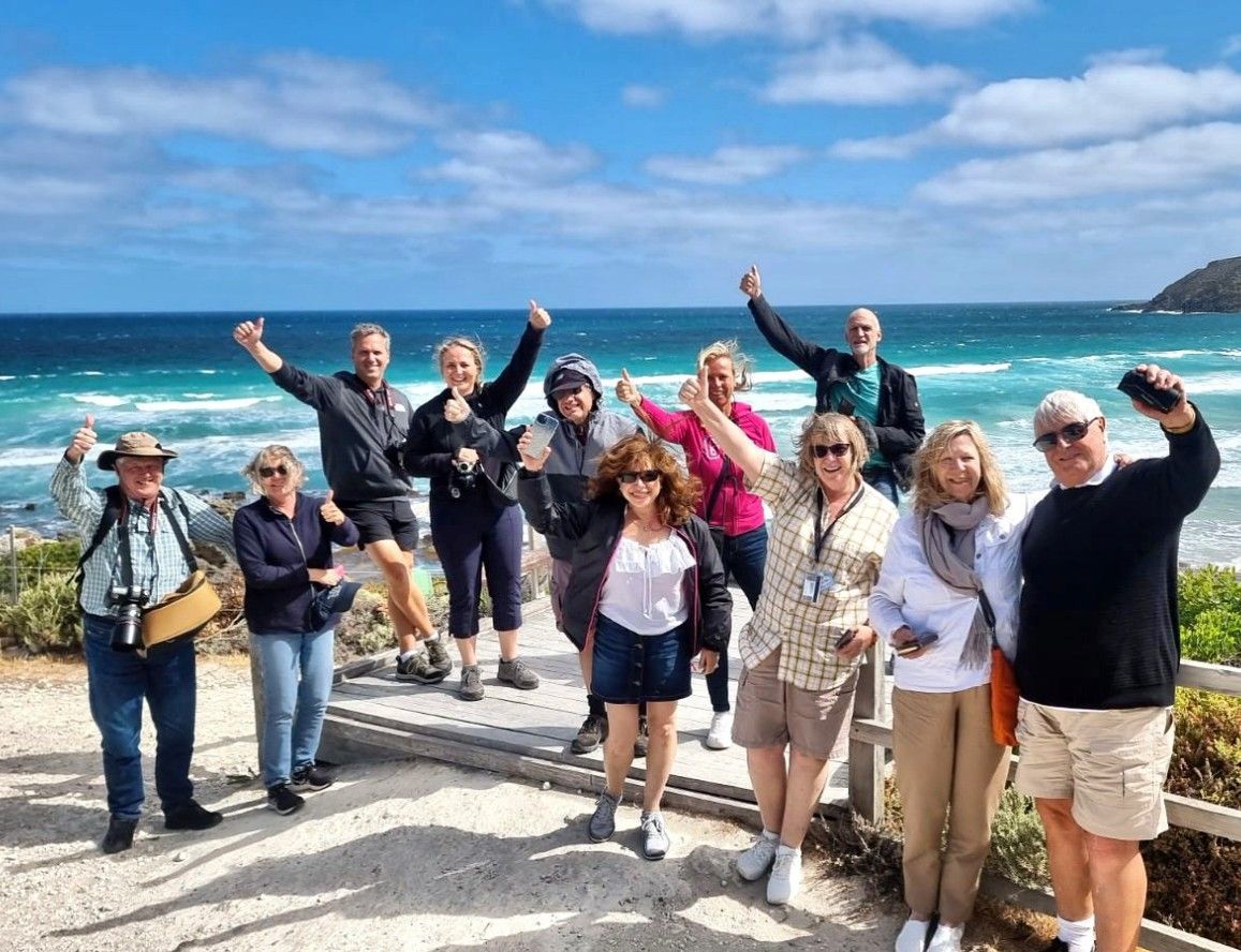 Tourist are posting at the beach