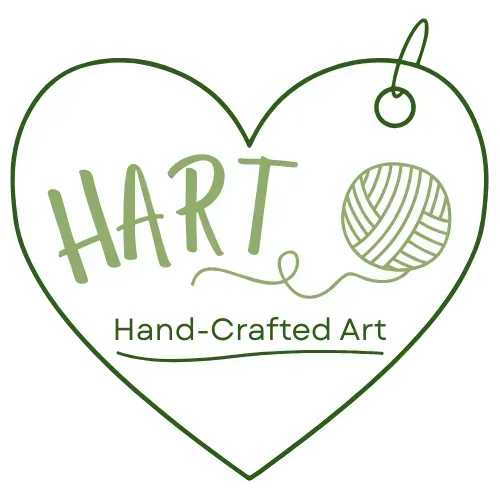 A heart-shaped logo with olive green outlines containing the text 