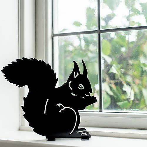 Silhouet eten eekhoorn