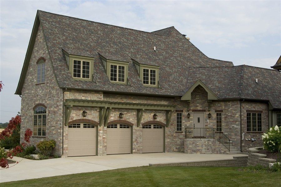 Model 60 in Sandstone with 6 Panel Double Arch Windows