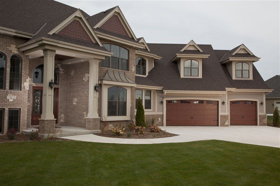 Model 64 in Mahogany with 3 Pane Double Arch Windows and Decorative Hardware