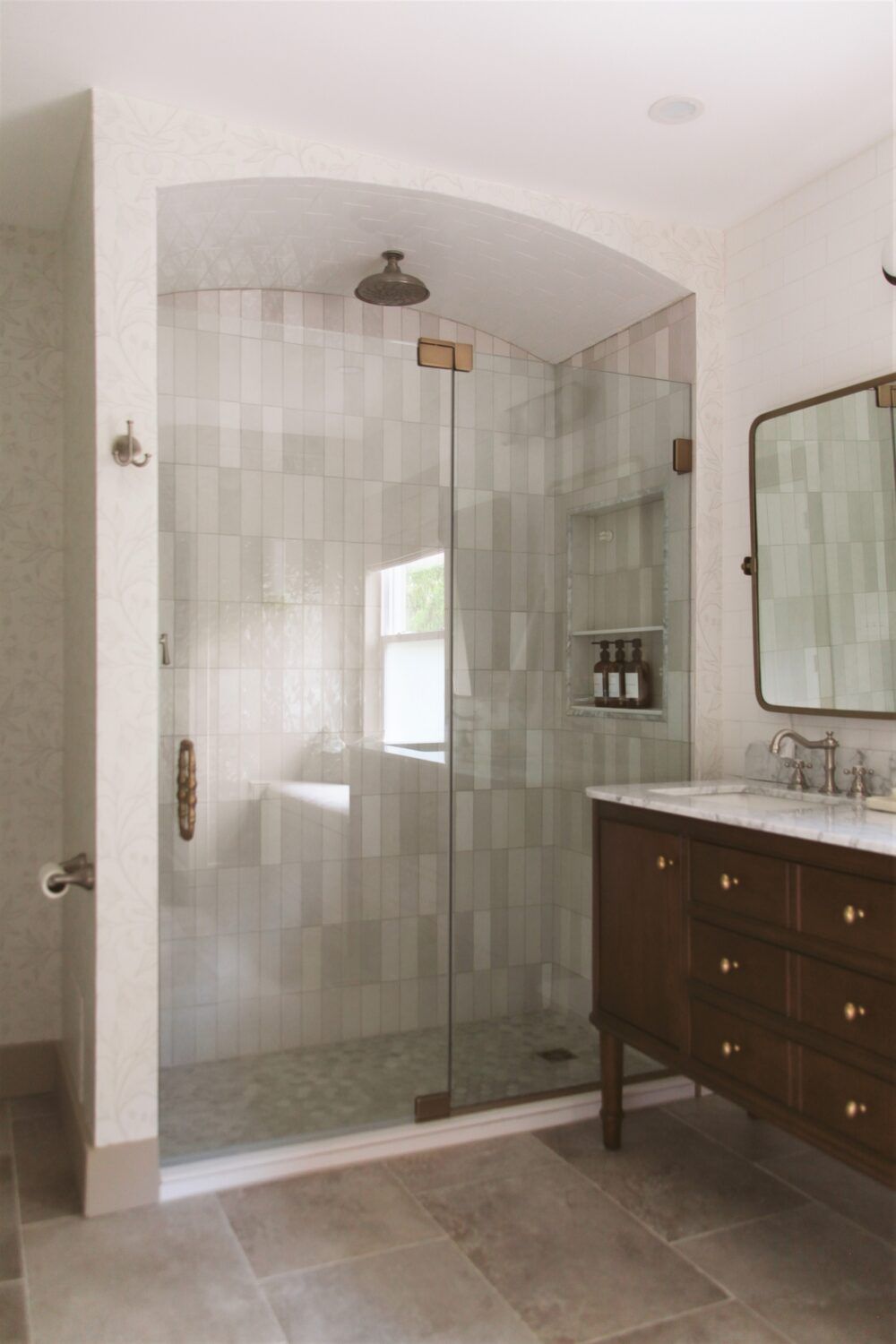 Tresor Door and Panel Enclosure with Pivot Hinges featuring Brushed Bronze and Clear Glass