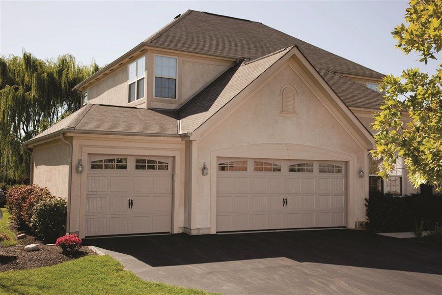 Model 60 in Sandstone with 6 Panel Double Arch Windows and Decorative Handles