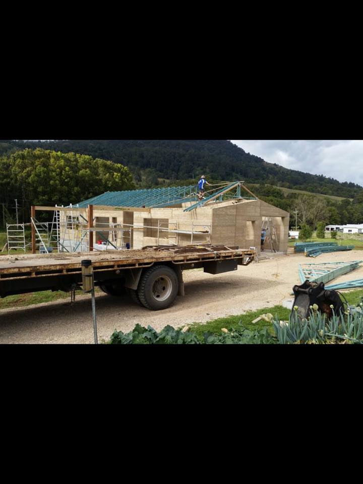 Truck with House Behind — Projects Gallery in Northern Rivers Region, NSW