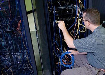 Technician Attaching Cables to a Network Server — IT Services in Corte Madera, CA