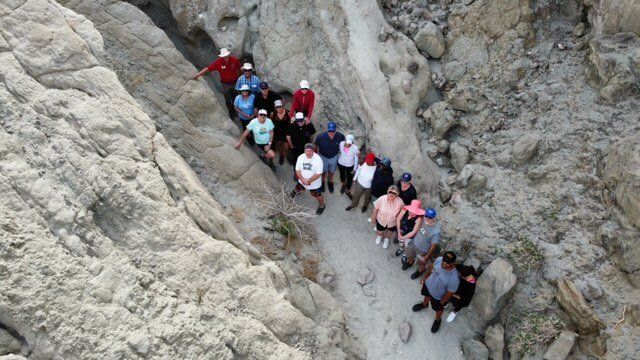 A group taking a tour in the San Andreas Fault Tour by Red Jeep Tours