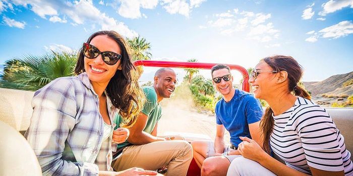 Friends and Family riding a Red Jeep in San Andreas Fault