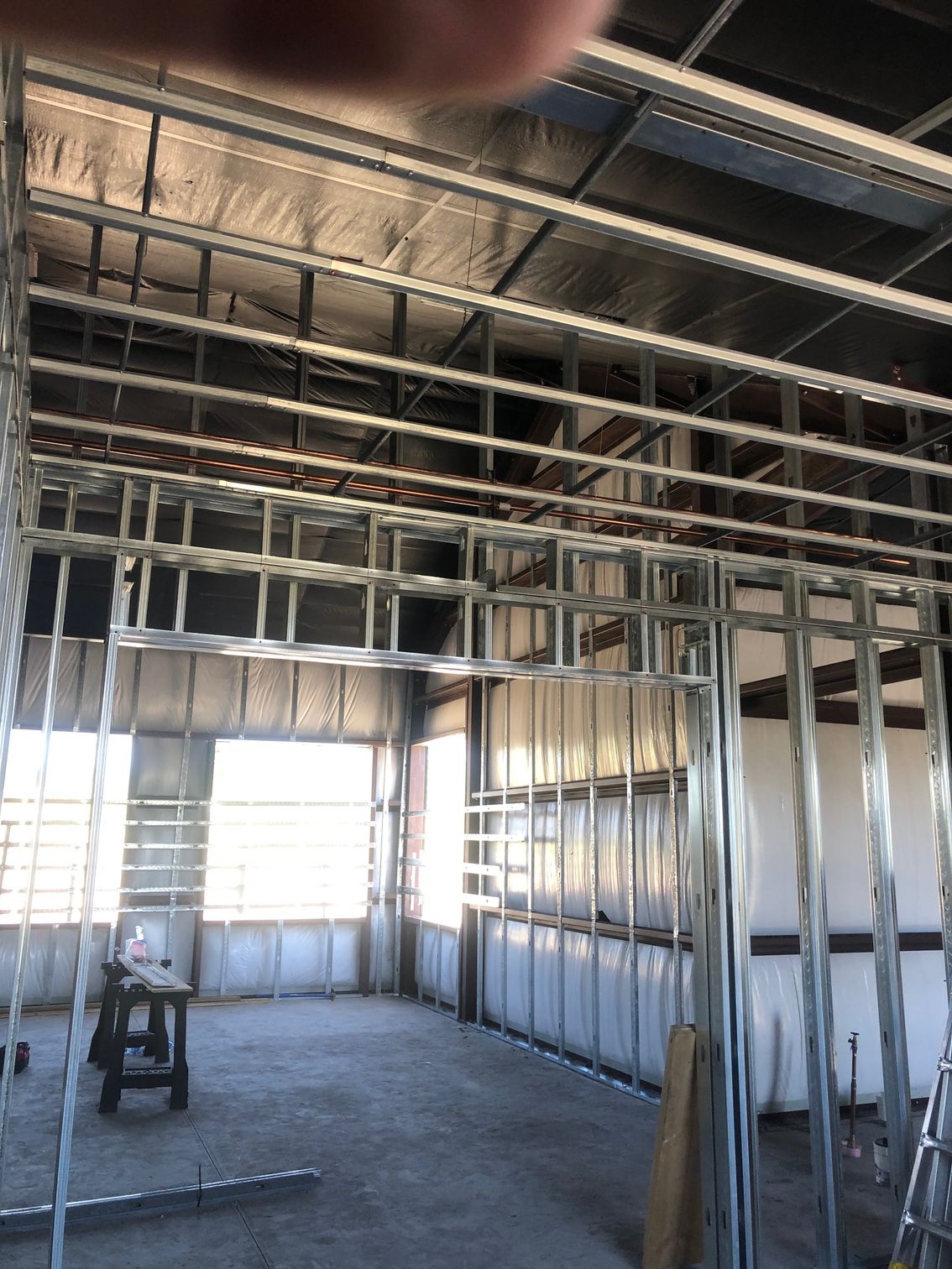 A room that is being built with a lot of metal frames.