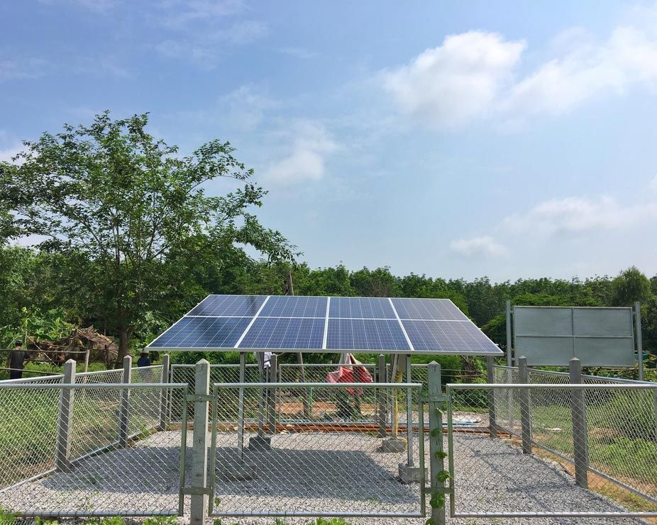 A Fenced In Area With A Solar Panel On Top Of It — Experienced Solar Installers in Tamworth