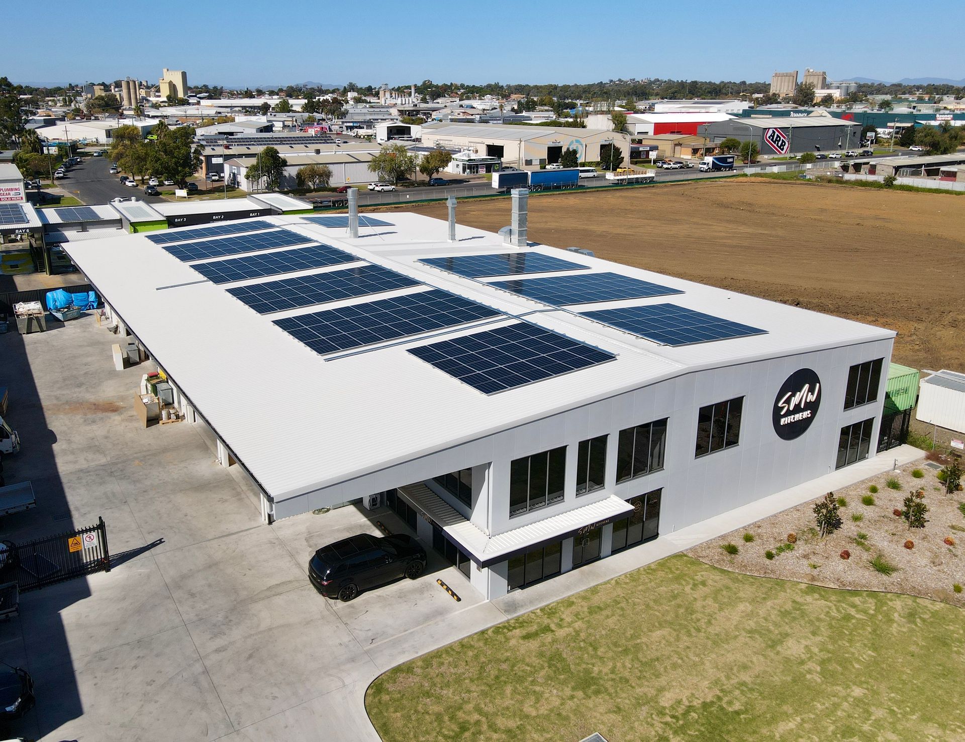 A Row Of Solar Panels Against A Cloudy Sky — High-Quality Solar Panels in Gunnedah