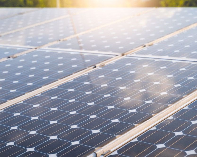 Close View Of Solar Panels With The Sun Shining Through Them — Experienced Solar Installers in Tamworth