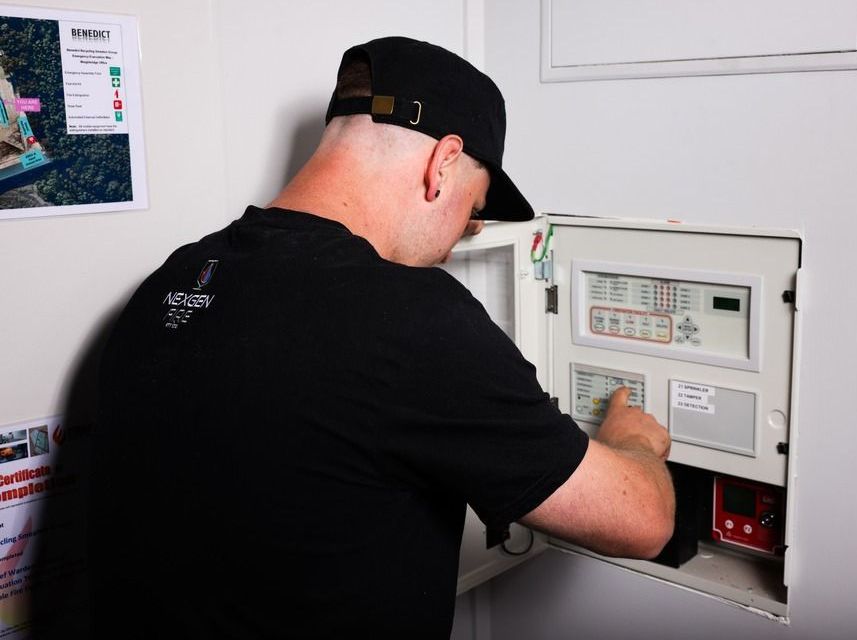 Man Fixing Alarm Systems