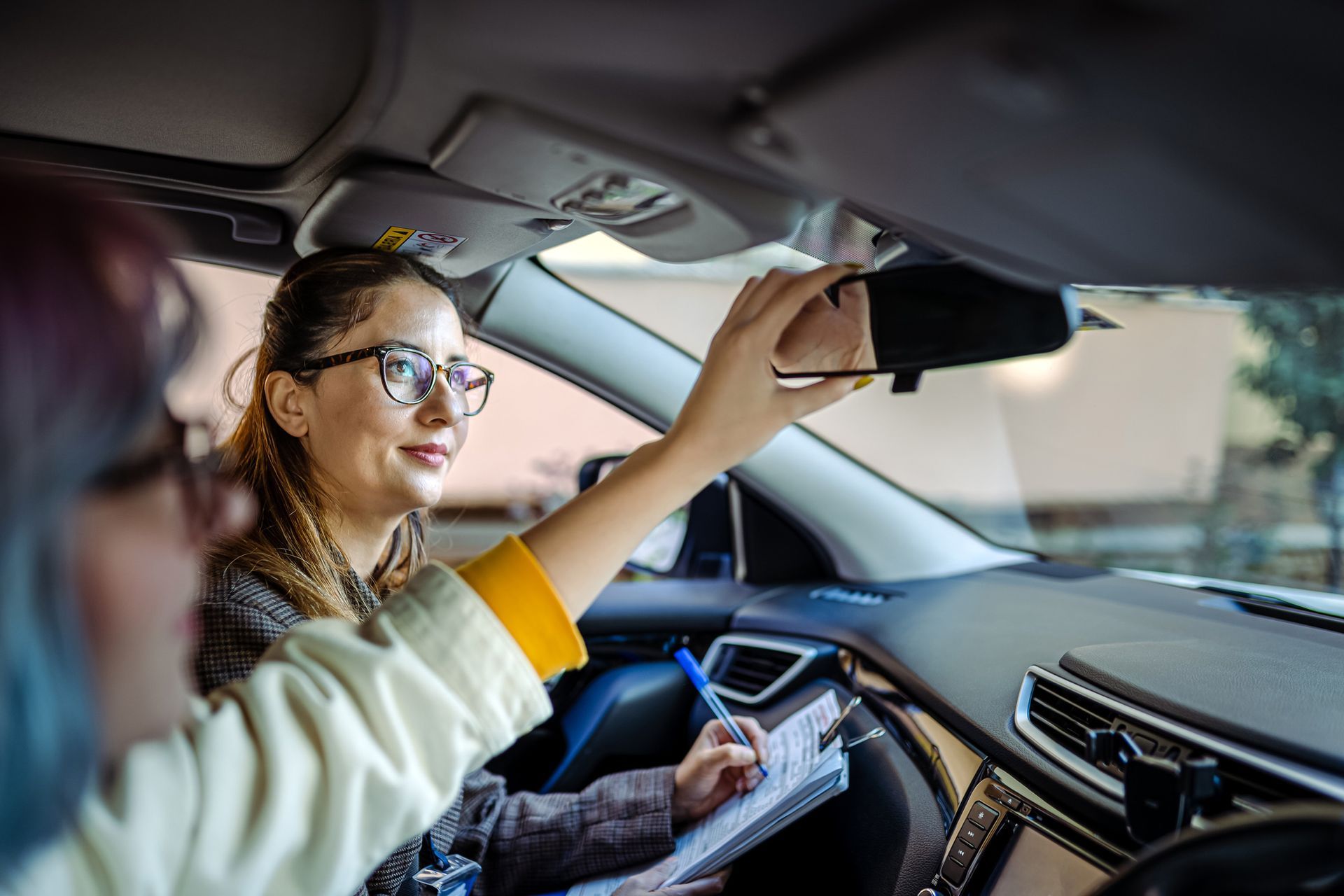 A Woman Is Teaching How To Drive A Car — Leesburg, GA — DOCO Driving School