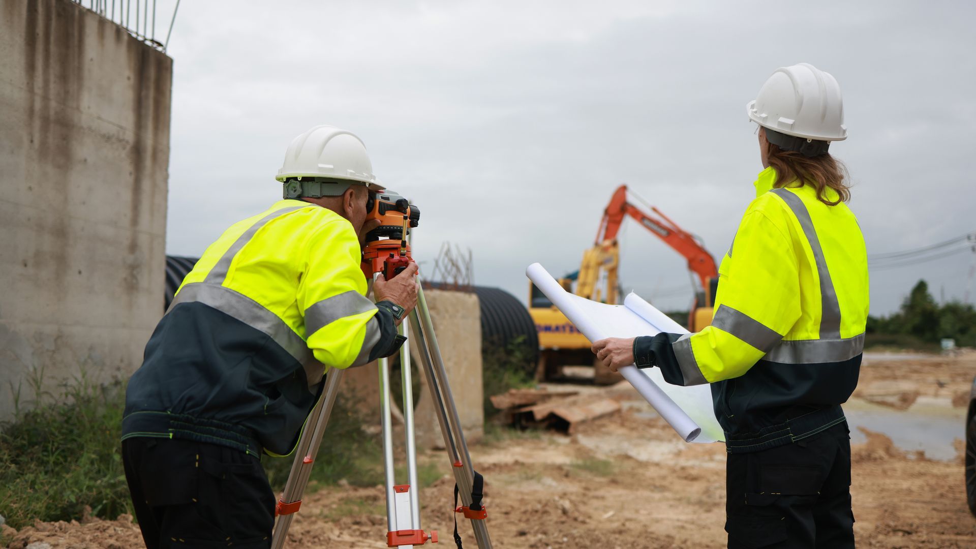 Surveyors working on a construction site