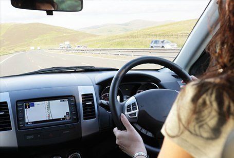 lady driving a car
