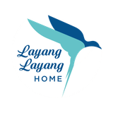 The logo for layang layang home shows a bird flying in the air.