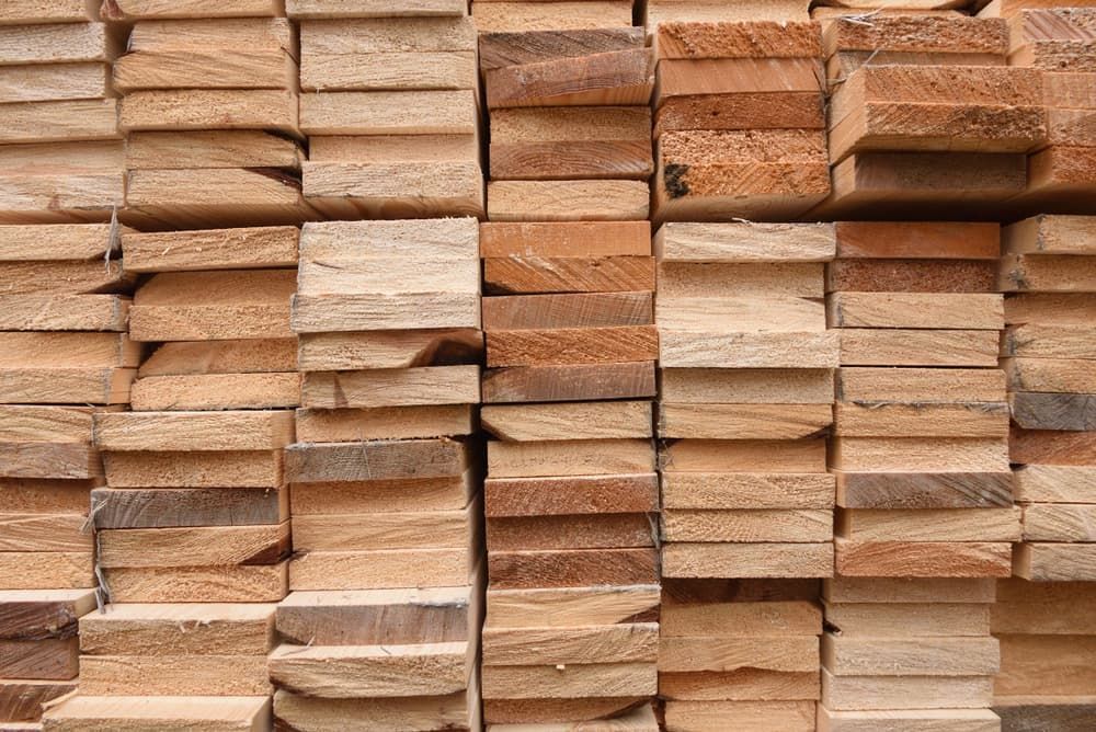 7 rows of timber planks stacked on top of one another.