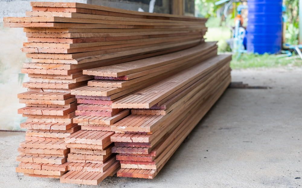A Pile of Wood Is Stacked on Top of Each Other on The Ground — Budget Timbers in Lismore, NSW