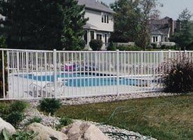 Aluminum Fencing — White Fencing in Swimming Pool in Dansville, MI