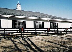 Farm Fencing — Small Fence Beside the Barn in Dansville, MI