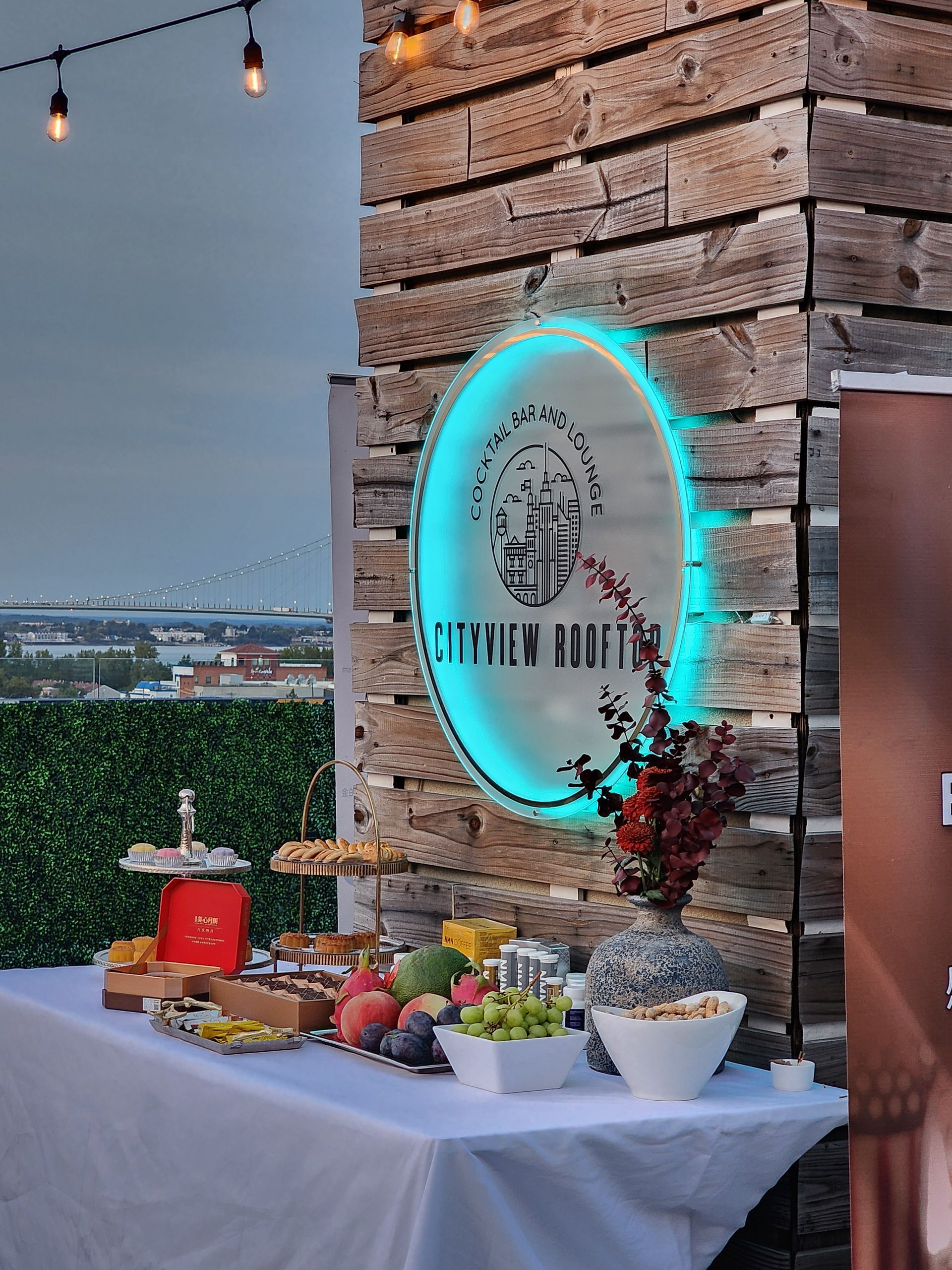 A table with food and a sign that says ' afternoon ' on it