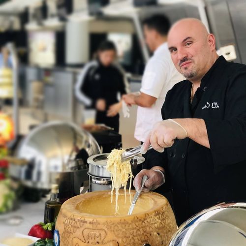 LCI Caterers chef 's preparing food