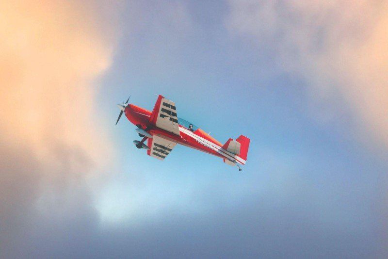 Stunt pilot flying a aerobatic biplane