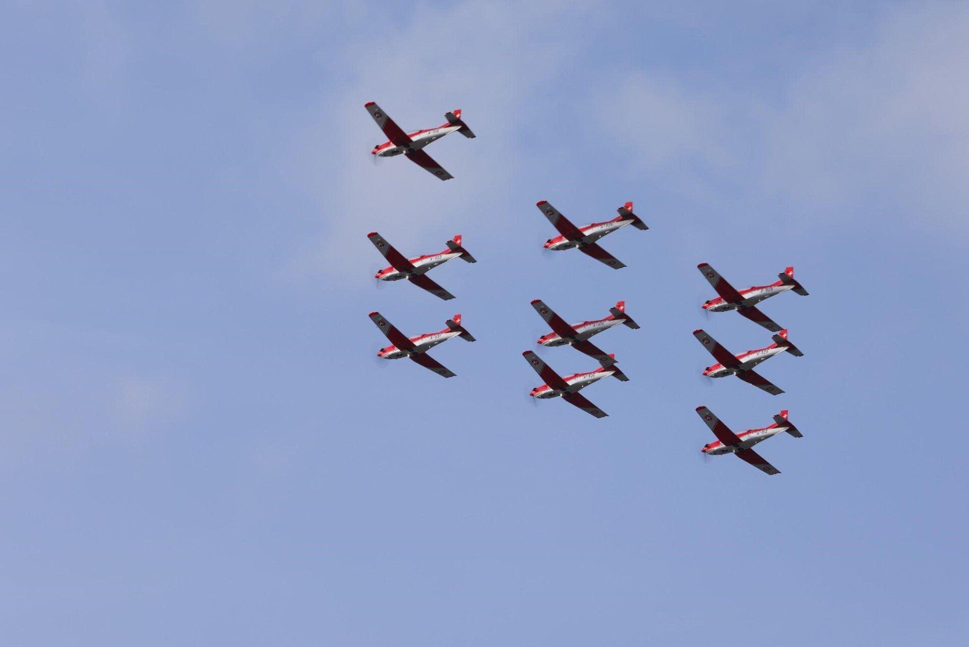 Group of aerobatic planes flying together