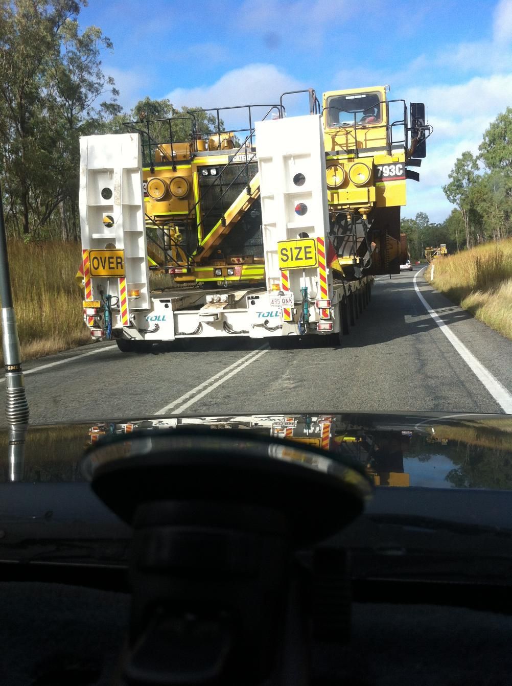 A Truck with A Yellow Sign that Says Cover on It — Col Adamson Transport Pilot Services In Farleigh, QLD
