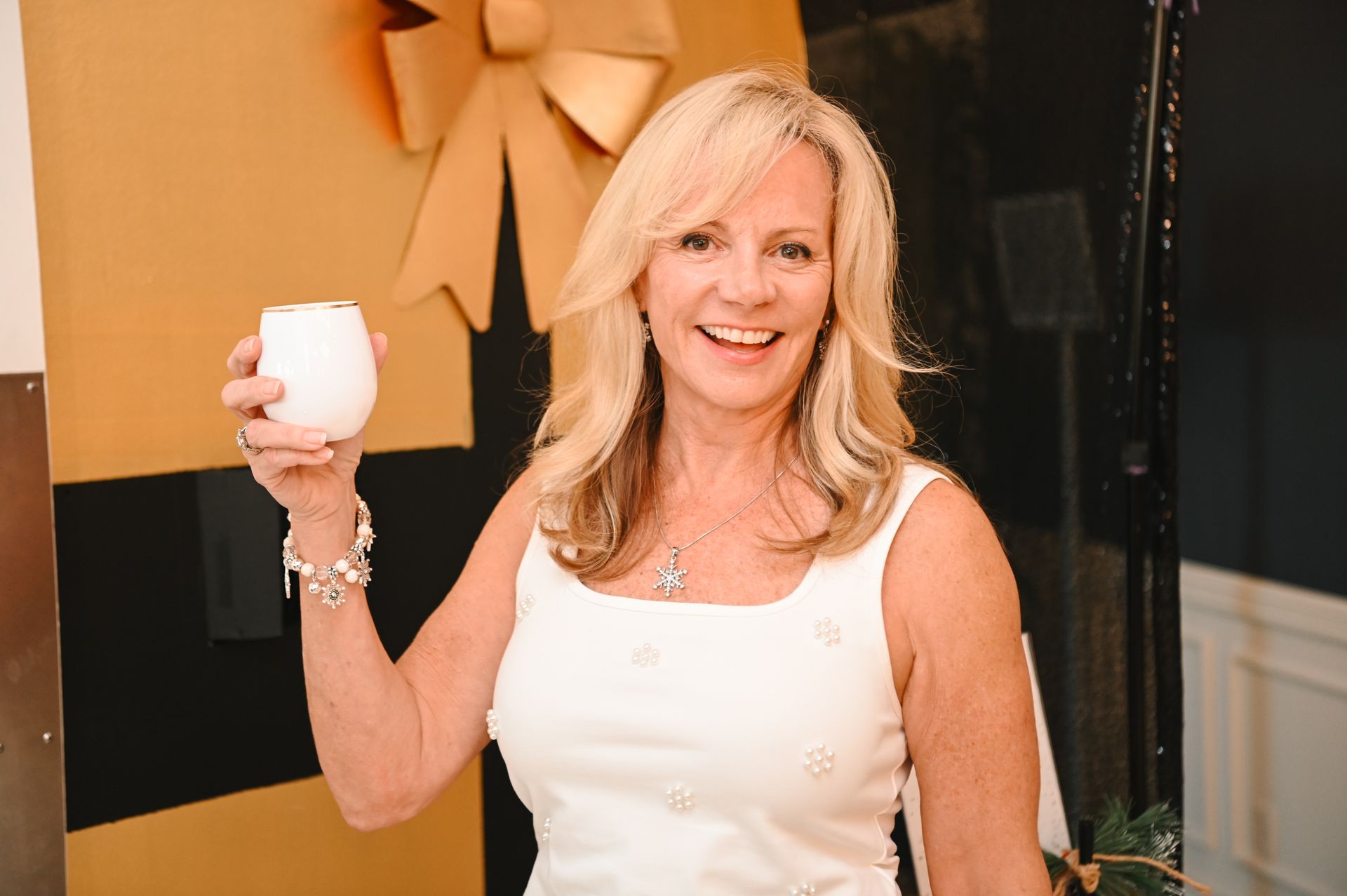 A guest holding her glass