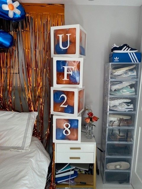 A photo of decorative boxes that celebrating seniors graduations.
