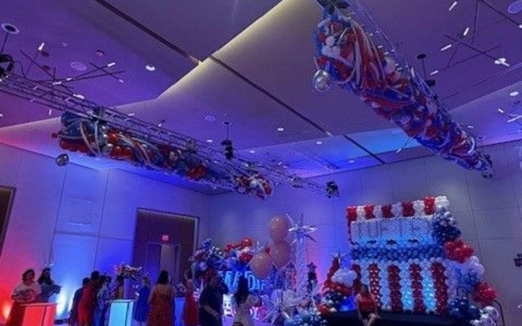 A photo of balloon rigging for a patriotic balloon drop at the Tuftex Convention in 2025