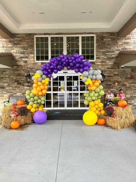Large, Purple and Yellow Balloon Arch