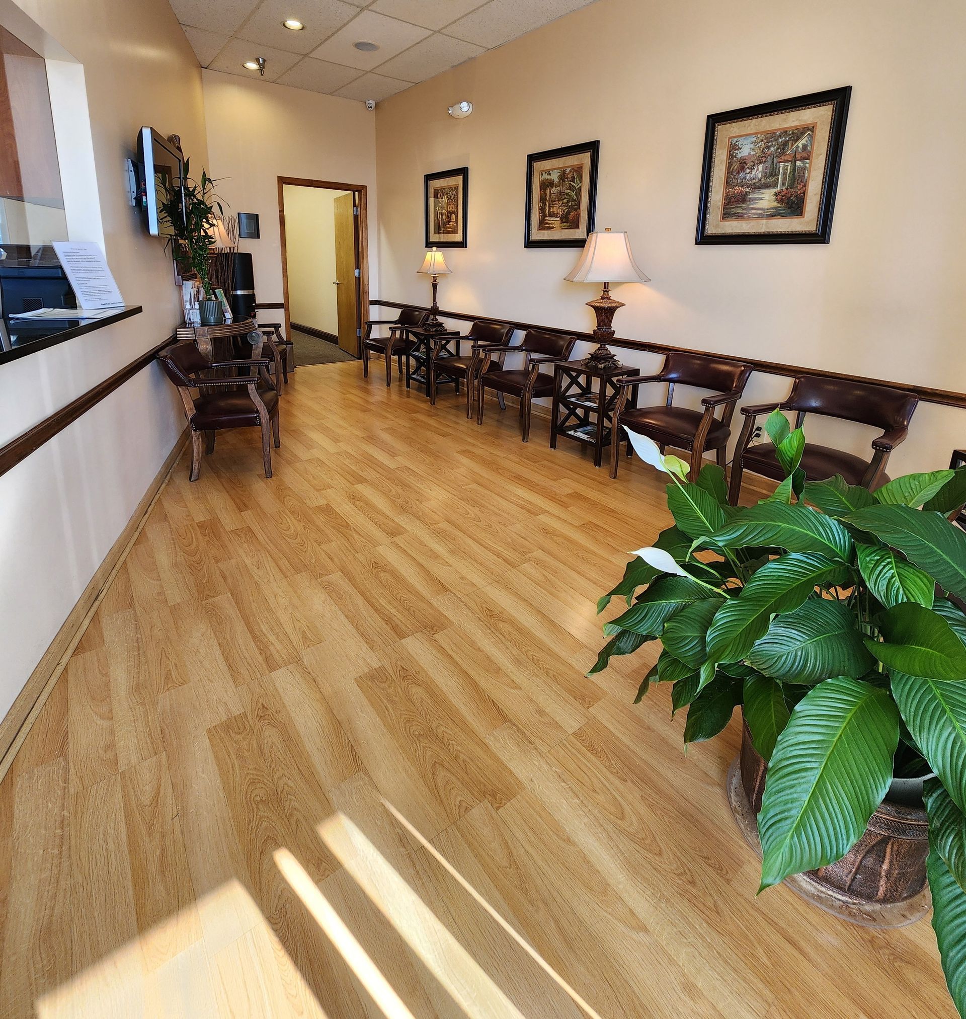 A dental office with a desk and a chair
