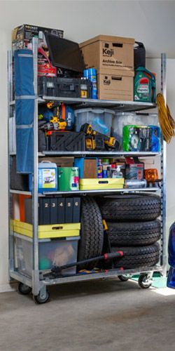 A close up of a metal ladder against a wall.