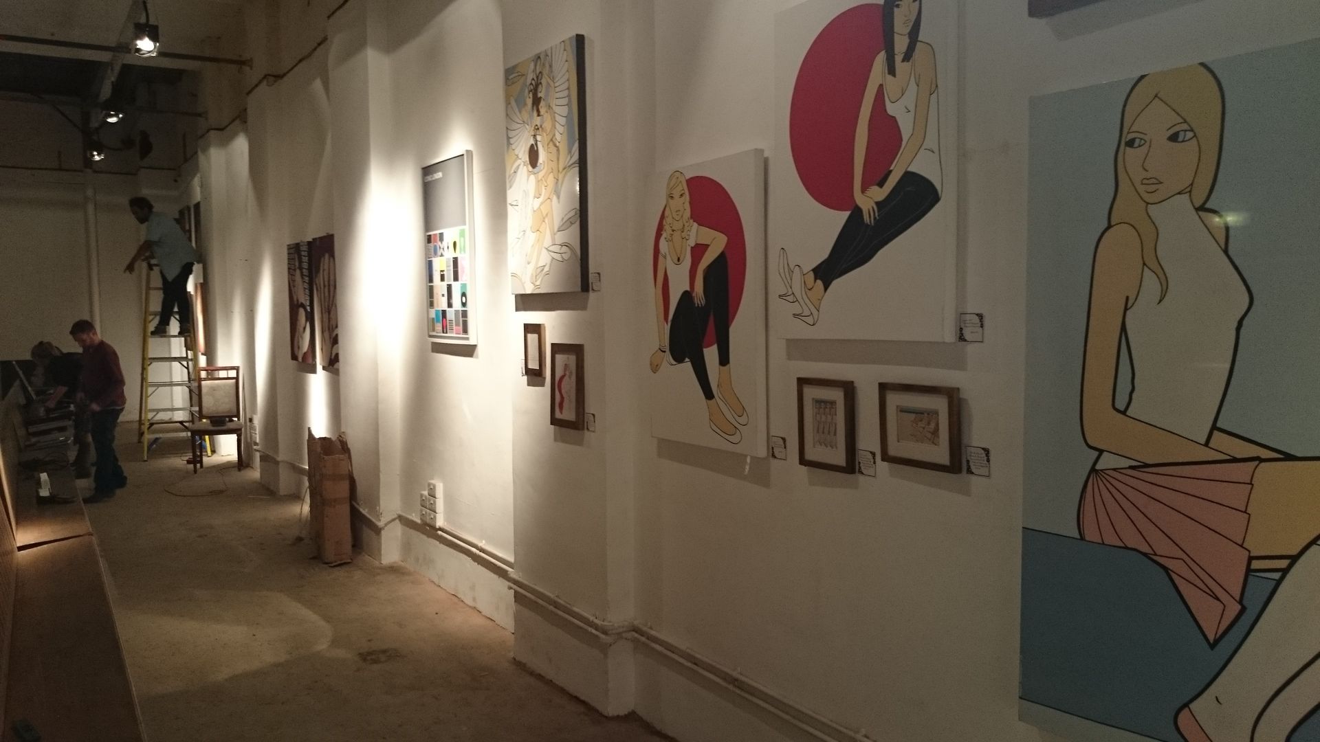 A light up sign with flamingo painting for Little Nan's Bar, by Matt Sargent