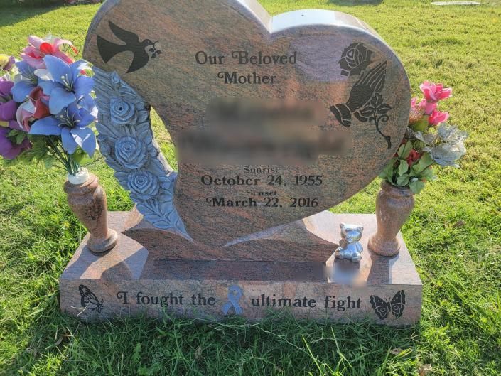 heart headstone with vases