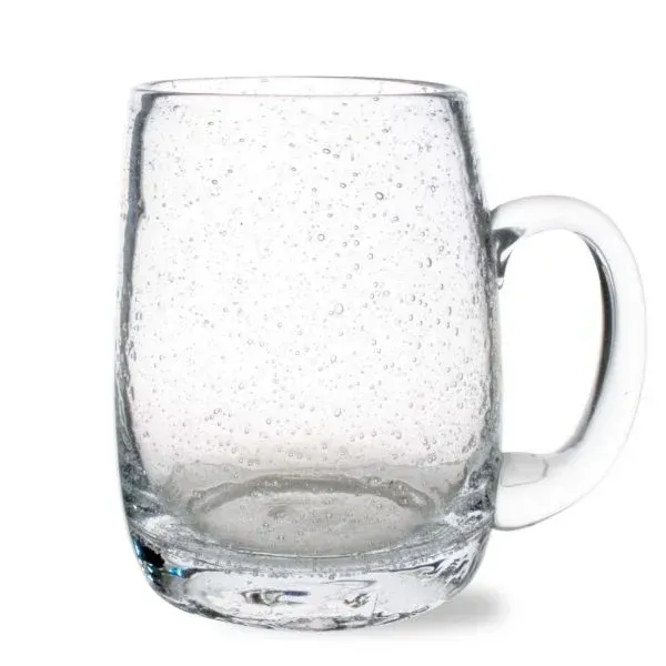 A clear glass mug with a handle on a white background