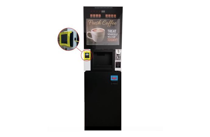 Coffee vending machine with a touch screen, contactless payment, and a cup dispenser.