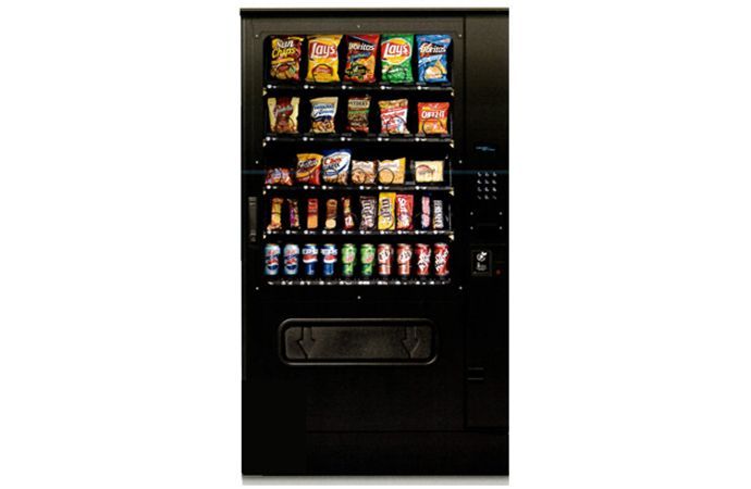 Black vending machine stocked with snacks and drinks.