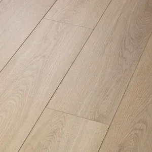 A close up of a wooden floor in a room.