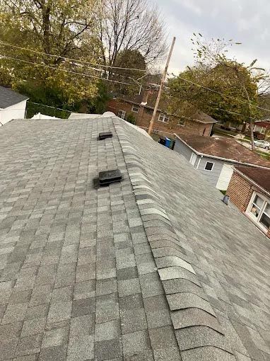 A close up of a roof with shingles on it.