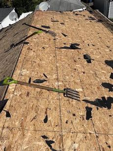 A roof with a lot of tools on it.