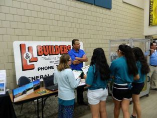 Man Answering Questions At Upward Bound — Sioux City, IA — L & L Builders Co.