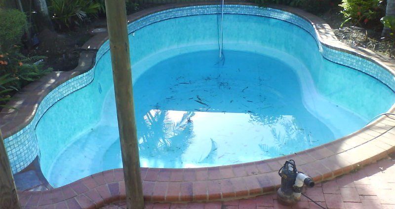 Water being pumped out of the pool for restoration