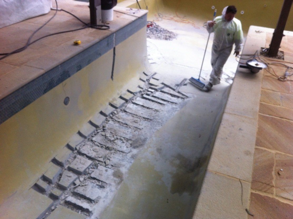 Repair work in progress on a pool with a broken back being Renovated in Sydney