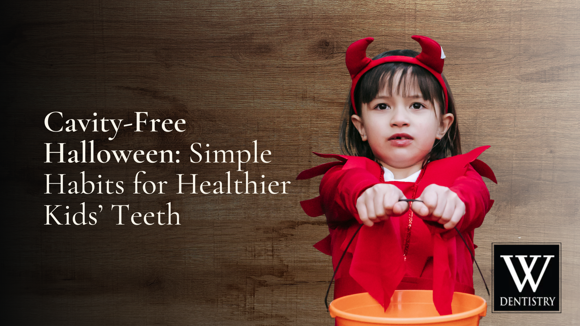 A child in a devil costume holds an orange bucket. Text: Cavity-Free Halloween: Simple Habits for Healthier Kids’ Teeth.